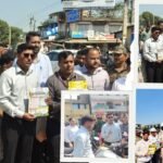 Road safety awareness campaign in rural Ranchi educating drivers about helmet use and traffic rules.