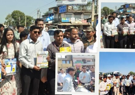 Road safety awareness campaign in rural Ranchi educating drivers about helmet use and traffic rules.